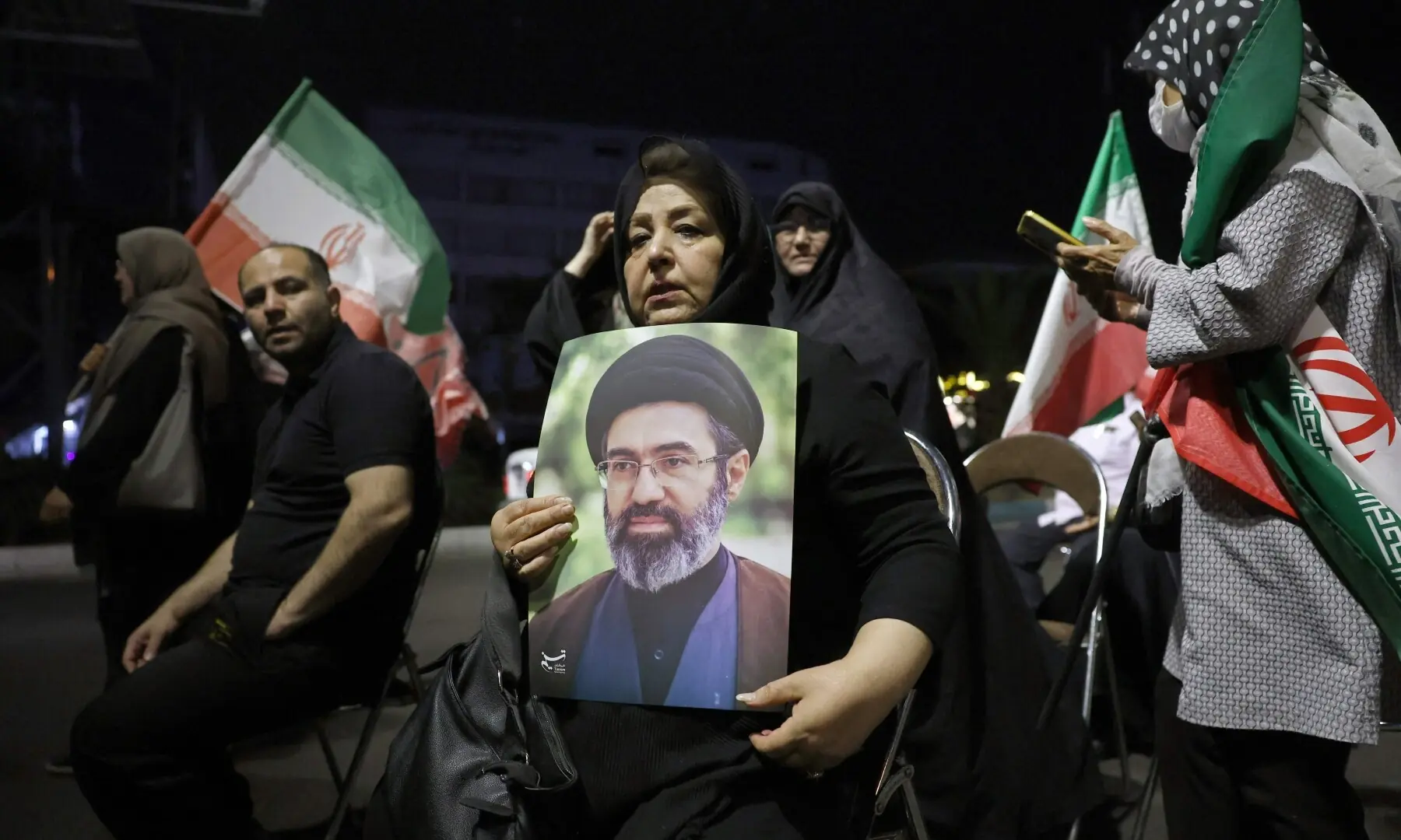 A woman holds a portrait of Iran&rsquo;s supreme leader Ayatollah Mojataba Khamenei during an anti-US and Israel rally in Tehran on May 29, 2026. &mdash; AFP