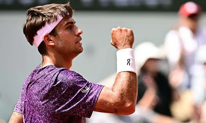 Italy’s Flavio Cobolli reacts after a point as he plays against US Learner Tien during their men’s singles match on day 7 of the French Open tennis tournament, on Court Philippe-Chatrier at the Roland-Garros Complex in Paris, France on May 30, 2026. — AFP