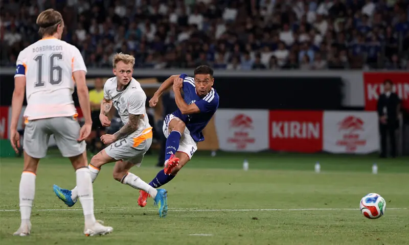 TOKYO: Japan&rsquo;s Yuto Nagatomo (R) shoots at goal during the international friendly against Iceland at the National Stadium on Sunday.&mdash;Reuters
