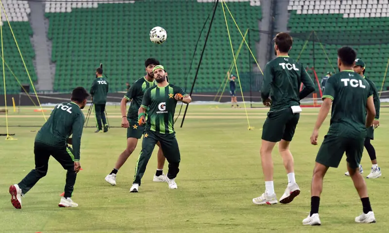 PAKISTAN cricketers play football during a training session at the Gaddafi Stadium on Monday.—Murtaza Ali/White Star PAKISTAN cricketers play football during a training session at the Gaddafi Stadium on Monday.—Murtaza Ali/White Star