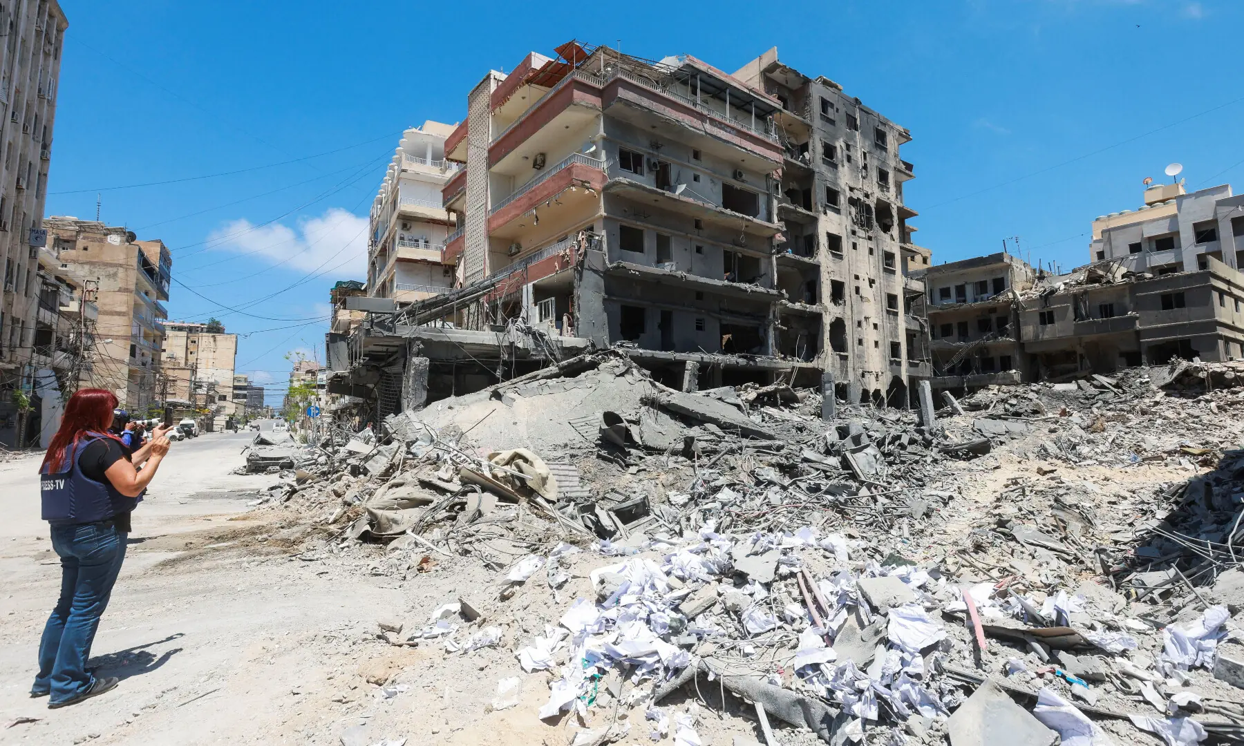 A person stands near the site of an Israeli strike carried out last week, in Tyre, Lebanon, June 2, 2026. REUTERS