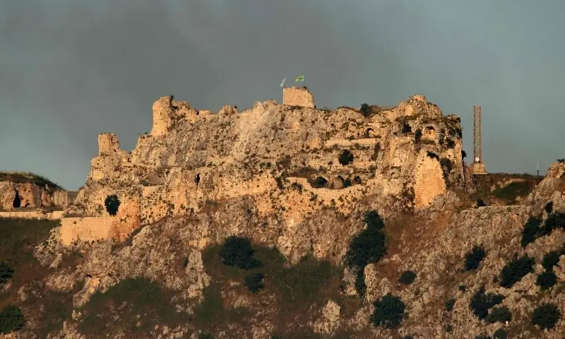  This photograph taken from the southern Lebanese area of Marjayoun shows smoke flying above the medieval Beaufort Castle, locally known as Qalaat al-Shaqif or Shaqif Arnoun, near the site of an Israeli strike that targeted the village of Arnoun on June 3, 2026. &mdash;AFP 