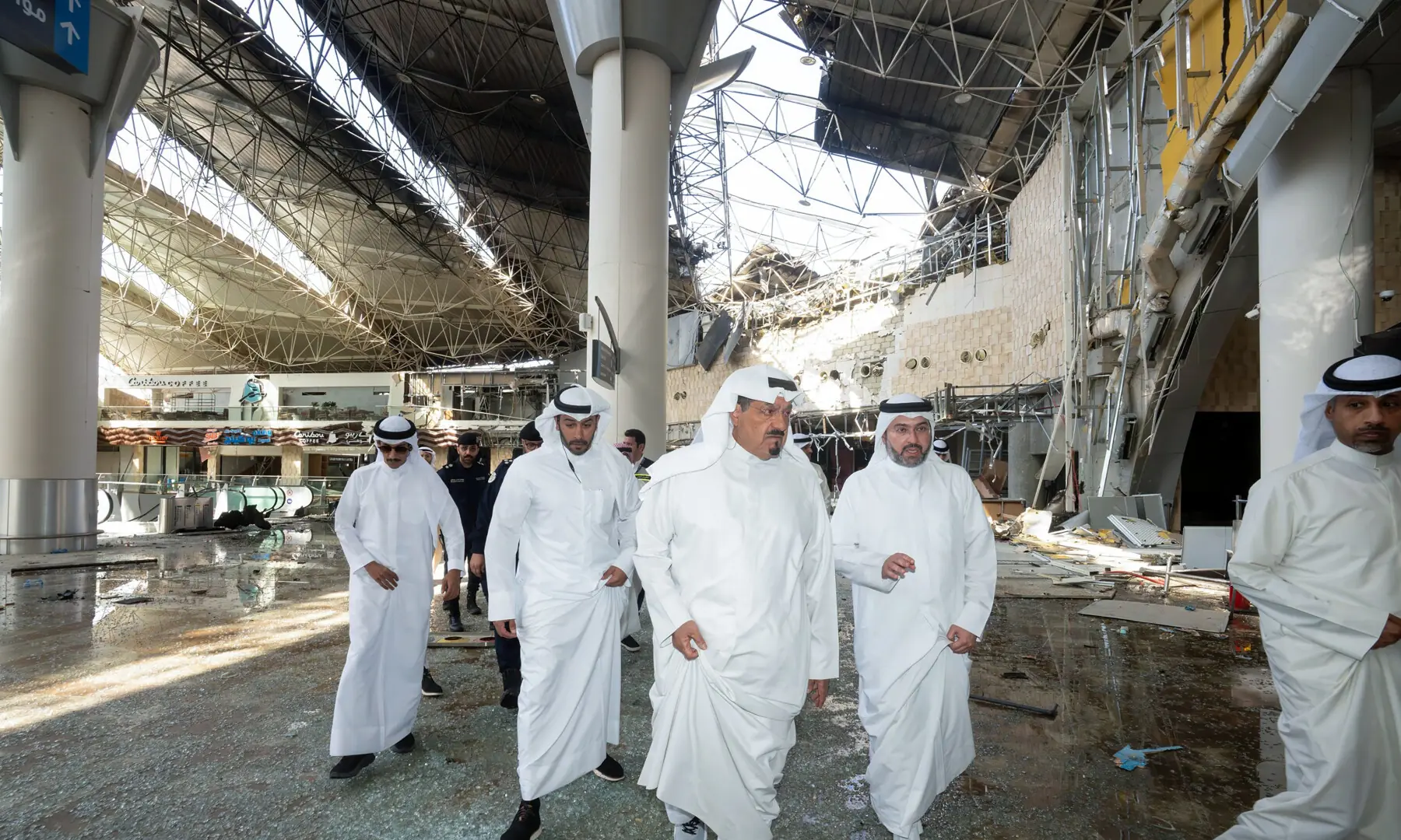  This handout photo provided by the Kuwaiti News Agency (KUNA) on June 3, 2026 shows Kuwaiti Prime Minister Sheikh Ahmad al-Abdullah al-Sabah (C) inspecting the damaged airport after an Iranian attack, in Kuwait City. &mdash; KUNA via AFP 
