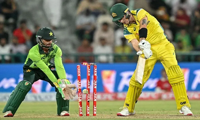 Australia's Adam Zampa (R) is clean bowled by Pakistan's Shadab Khan during the third one-day international (ODI) cricket match between Australia and Pakistan at Gaddafi Stadium in Lahore on June 4, 2026. &mdash; AFP