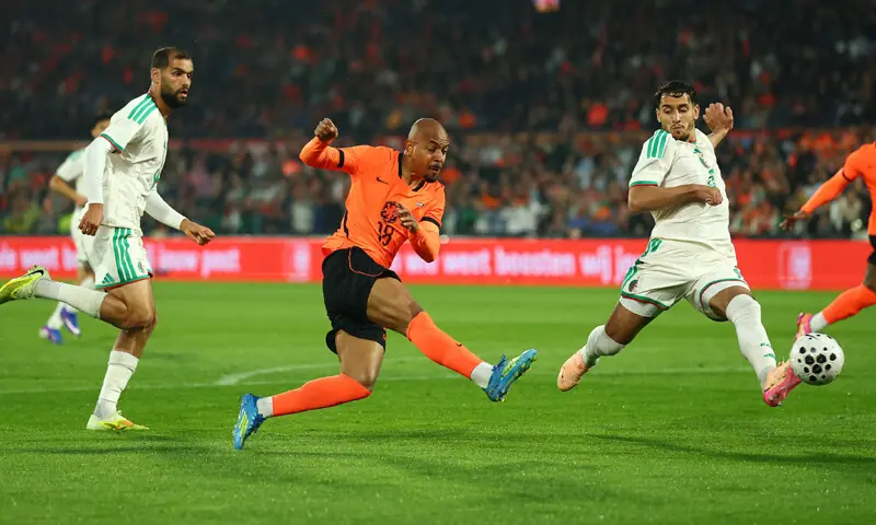 ROTTERDAM: Donyell Malen (C) of the Netherlands shoots during the international friendly against Algeria at the De Kuip Stadium.&mdash;Reuters