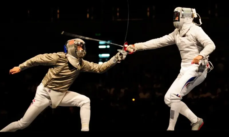 Germany's Sebastian Bachmann (R) competes with Chile's Felipe Alvear during the men's individual foil preliminary round at the World Fencing Championship in Antalya September 30. Photo for representation. &mdash;Reuters/File