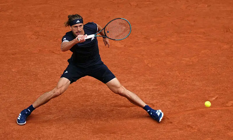 PARIS: Germany&rsquo;s Alexander Zverev plays a forehand return to Jakub Mensik of the Czech Republic during their French Open semi-final on Court Philippe-Chatrier at the Roland Garros Complex on Friday.&mdash;AFP