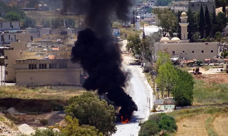 Smoke rises from a vehcile targeted by an Israeli drone attack in the southern Lebanese city of Nabatieh on June 5, 2026. &mdash;AFP