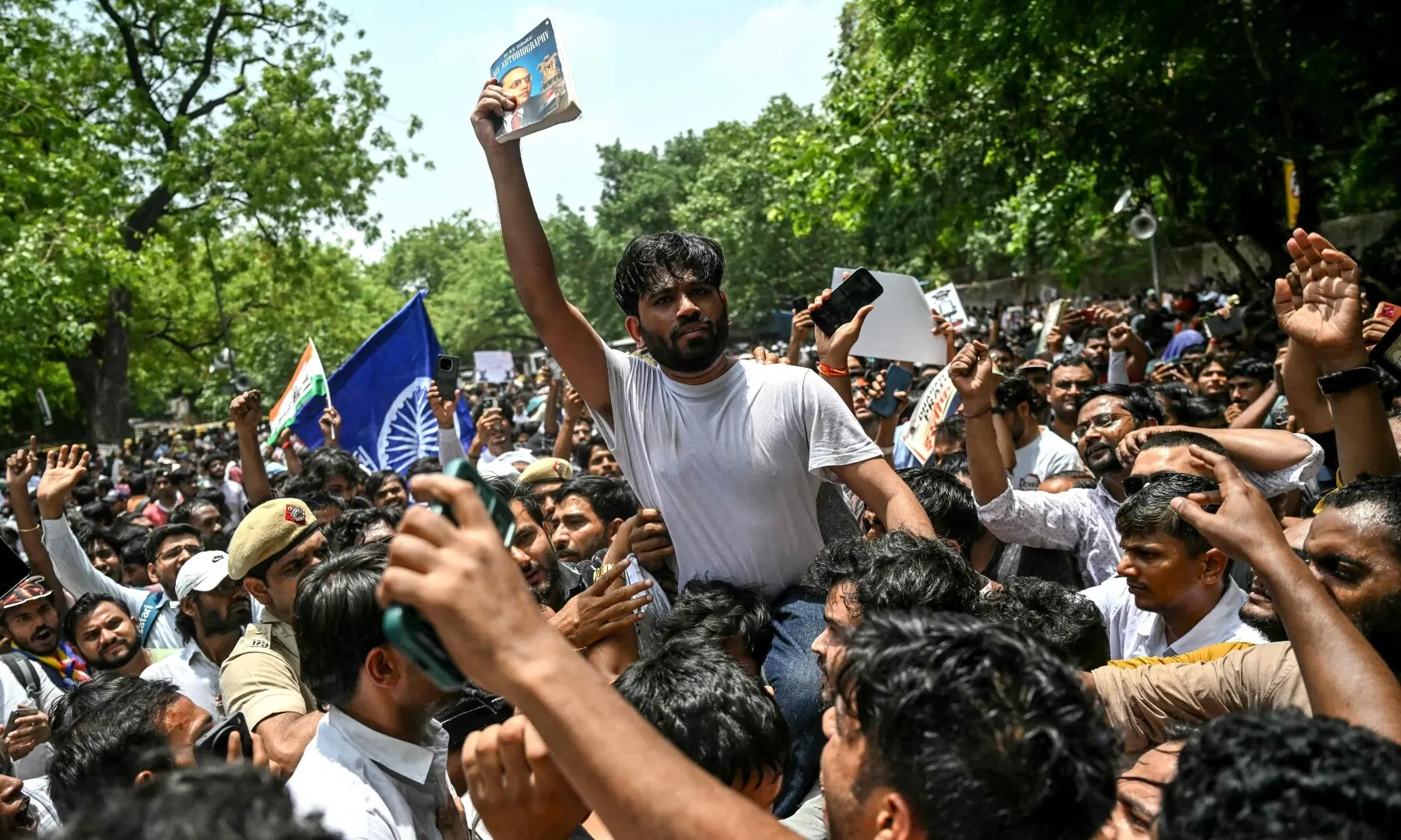 Cockroach Janta Party (CJP) founder Abhijeet Dipke (C) takes part in a protest over alleged irregularities in the country’s major examinations, in New Delhi on June 6, 2026. —AFP