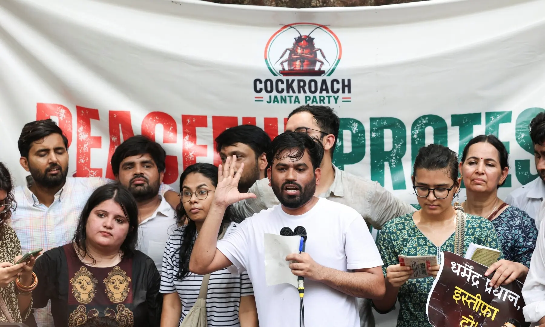 Abhijeet Dipke, head of the Cockroach Janta Party (CJP), speaks to supporters of the CJP during a sit-in protest demanding the resignation of Indian Education Minister Dharmendra Pradhan, in New Delhi, India on June 6, 2026. —Reuters