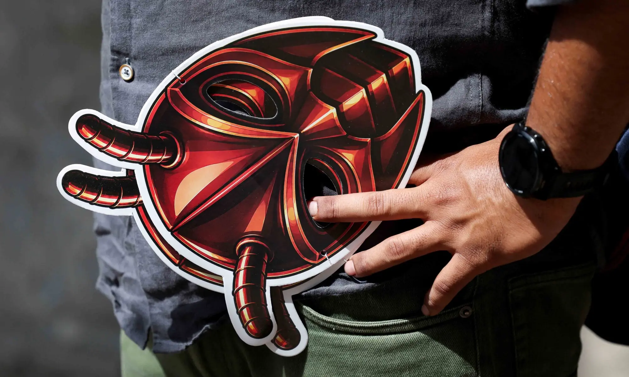 A person holds a cockroach themed mask, as supporters of the Cockroach Janta Party (CJP) await the arrival of Abhijeet Dipke, head of the CJP, on the day of a sit-in protest demanding the resignation of Indian Education Minister Dharmendra Pradhan, in New Delhi, India, June 6, 2026. — Reuters