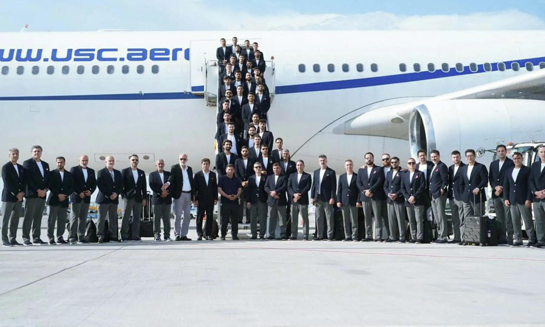 This handout photograph taken and released by Iran Football Federation Press Office on June 6, 2026 shows Iran’s national football team posing at Antalya Airport in Turkiye before boarding a plane ahead of their departure to Mexico for the FIFA 2026 World Cup football tournament, — AFP