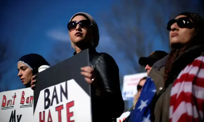Activist groups including the Council on American-Islamic Relations, MoveOn.org, Oxfam, and the ACLU hold a rally in front of the White House to mark the anniversary of the first Trump administration travel and refugee ban in Washington, US on January 27, 2018. &mdash; Reuters/File