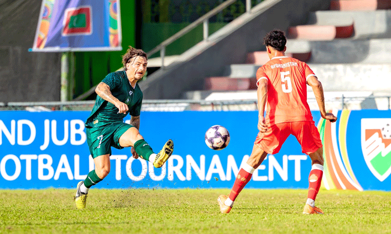 MALE: Pakistan’s Otis Khan (L) in action during the Diamond Jubilee International Football Tournament match against Afghanistan at the National Stadium on Sunday.—Courtesy PFF MALE: Pakistan’s Otis Khan (L) in action during the Diamond Jubilee International Football Tournament match against Afghanistan at the National Stadium on Sunday.—Courtesy PFF