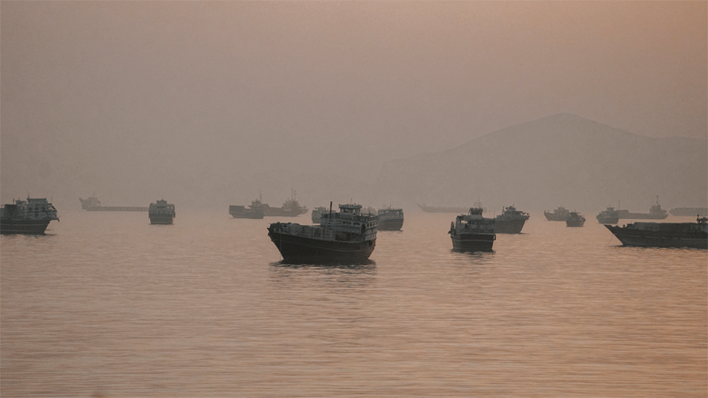 Vessels are anchored in the Strait of Hormuz as seen from Musandam, Oman.&mdash;Reuters/file