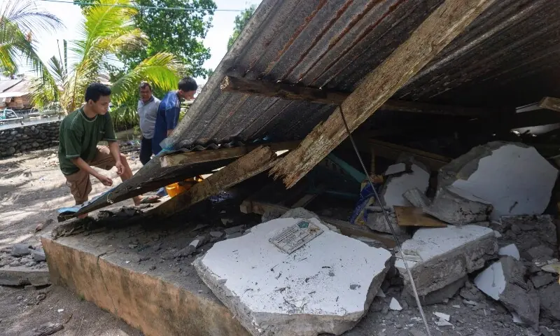 People collect their belongings from a damaged house following an earthquake off the southern Philippine island of Mindanao that was also felt in North Tabukan, Sangihe Islands regency, North Sulawesi province, Indonesia, June 8, 2026. —Reuters People collect their belongings from a damaged house following an earthquake off the southern Philippine island of Mindanao that was also felt in North Tabukan, Sangihe Islands regency, North Sulawesi province, Indonesia, June 8, 2026. —Reuters
