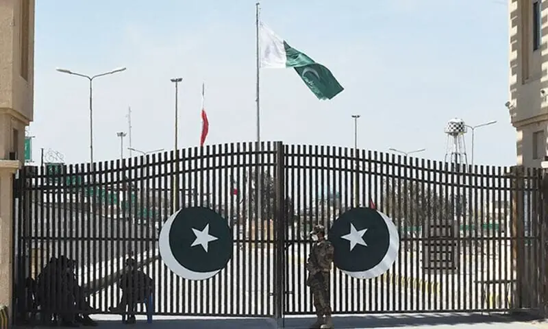 In this file photo soldiers wearing facemasks stand guard at the closed Pakistan-Iran border in Taftan. — AFP/File In this file photo soldiers wearing facemasks stand guard at the closed Pakistan-Iran border in Taftan. — AFP/File