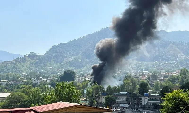 Smoke billows after a Pakistan Army Aviation Mi-17 helicopter crashed near Muzaffarabad, Azad Jammu and Kashmir on June 10, 2026. — Reuters