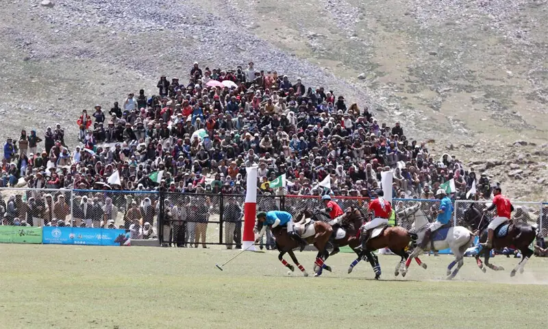 Players in action during the opening match of Shandur Polo Festival on Thursday. — White Star/PPI Players in action during the opening match of Shandur Polo Festival on Thursday. — White Star/PPI