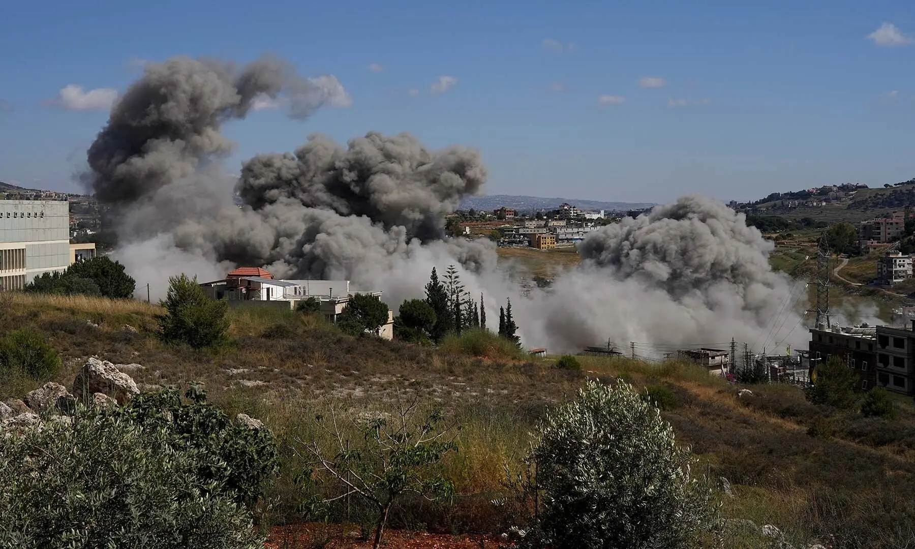 Smoke billows from southern Lebanon following an Israeli strike, as seen from Nabatieh, Lebanon on June 13, 2026. &mdash; Reuters