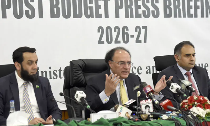 FINANCE Minister Muhammad Aurangzeb addresses the post-budget press conference. Information Minister Atta Tarar and State Minister for Finance Bilal Azhar Kiyani are also seen.—Dawn FINANCE Minister Muhammad Aurangzeb addresses the post-budget press conference. Information Minister Atta Tarar and State Minister for Finance Bilal Azhar Kiyani are also seen.—Dawn