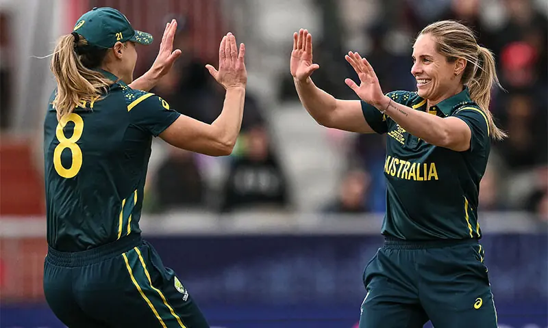 MANCHESTER: Australian skipper Sophie Molineux (R) celebrates with team-mate Ellyse Perry after dismissing South African batter Sune Luus during their Women’s T20 World Cup match at Old Trafford on Saturday.—AFP MANCHESTER: Australian skipper Sophie Molineux (R) celebrates with team-mate Ellyse Perry after dismissing South African batter Sune Luus during their Women’s T20 World Cup match at Old Trafford on Saturday.—AFP