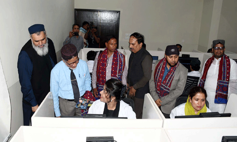 ONE of the visiting Bangladeshi academics interacts with a student as LUMHS Vice Chancellor Prof Dr Ikram Din Ujjan looks on.—Dawn ONE of the visiting Bangladeshi academics interacts with a student as LUMHS Vice Chancellor Prof Dr Ikram Din Ujjan looks on.—Dawn
