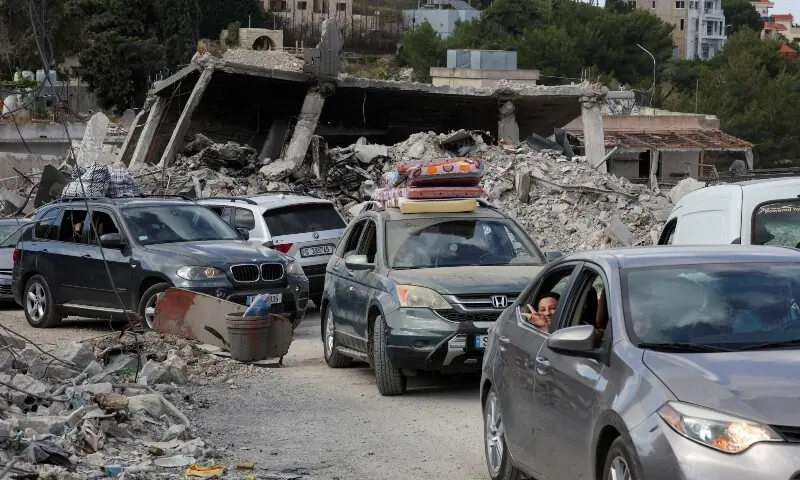  Displaced people transport their belongings on a roof of a car, as they make their way back to their homes, following a peace deal between the United States and Iran, in Bir Al-Salasil, Tyre district, southern Lebanon, June 15, 2026. &mdash;Reuters 