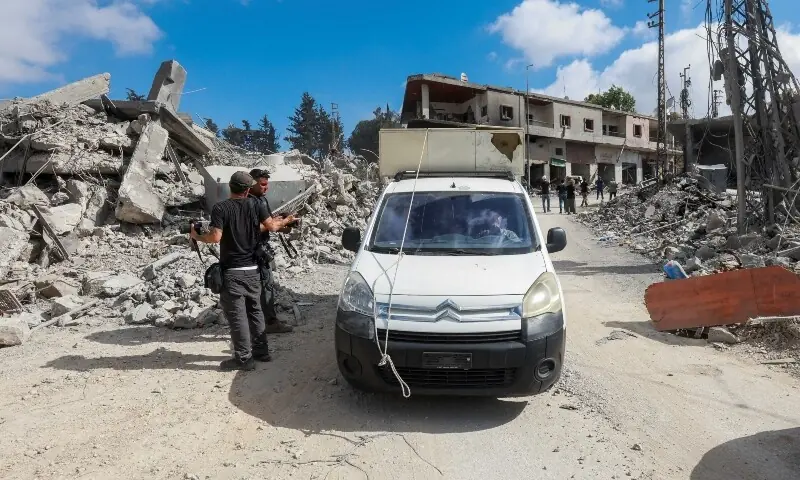  Displaced people transport their belongings on a roof of a car, as they make their way back to their homes, following a peace deal between the United States and Iran, in Bir Al-Salasil, Tyre district, southern Lebanon, June 15, 2026. &mdash;Reuters 