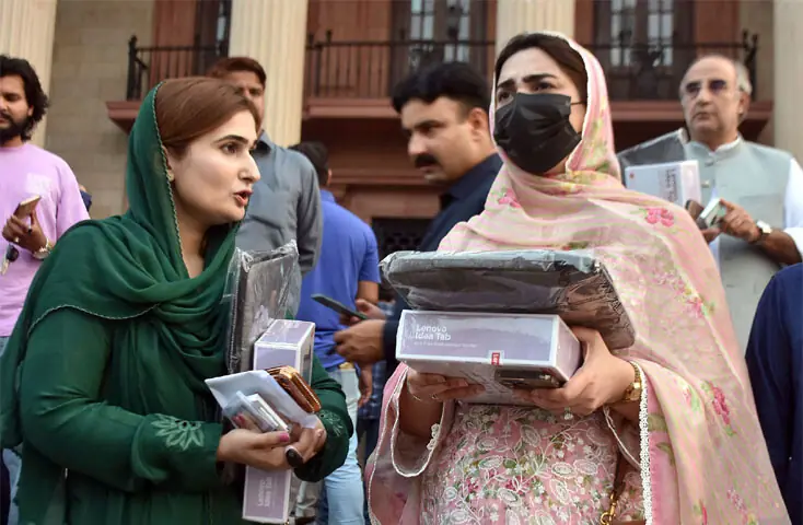 Punjab Assembly members come out of the house holding tabs distributed among them under the first fully paperless e-assembly initiative. With an iPad at each desk, lawmakers can now instantly access the required information. &mdash; Online