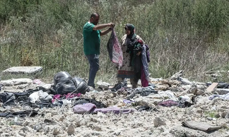  Residents search through the rubble of their homes after returning to the southern village of Srifa on June 16, 2026. &mdash;AFP 