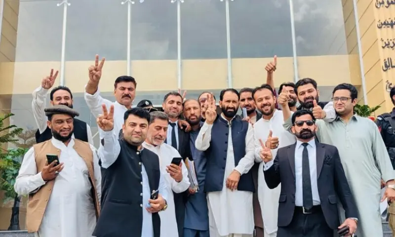 PPP candidate Attaullah Khan flashes the victory sign at the GB Election Commission after being announced as the successful candidate. —Photo provided by author PPP candidate Attaullah Khan flashes the victory sign at the GB Election Commission after being announced as the successful candidate. —Photo provided by author