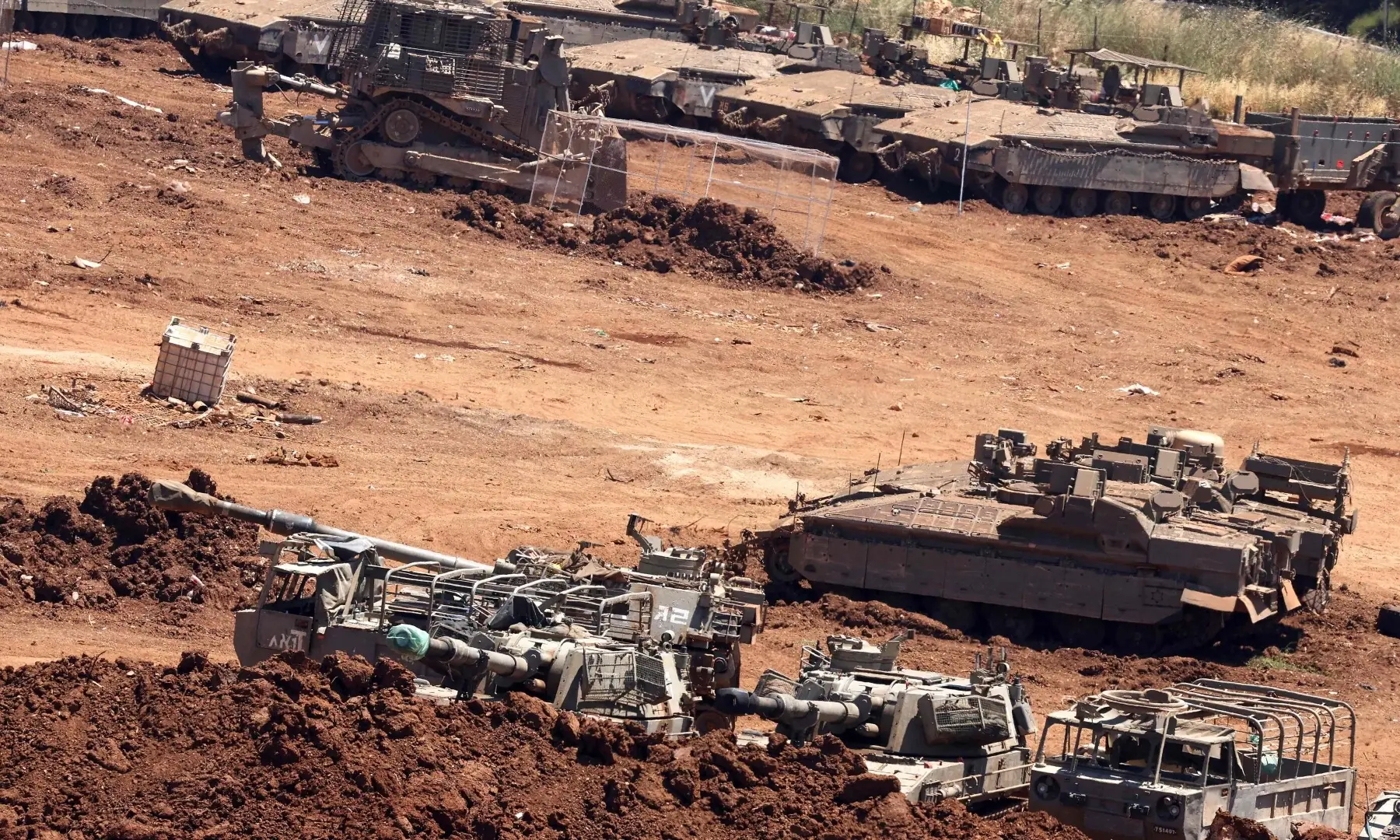 This picture taken from a position in the Upper Galilee in northern Israel, near the Israel-Lebanon border shows Israeli military vehicles in southern Lebanon on June 17, 2026. &mdash; AFP