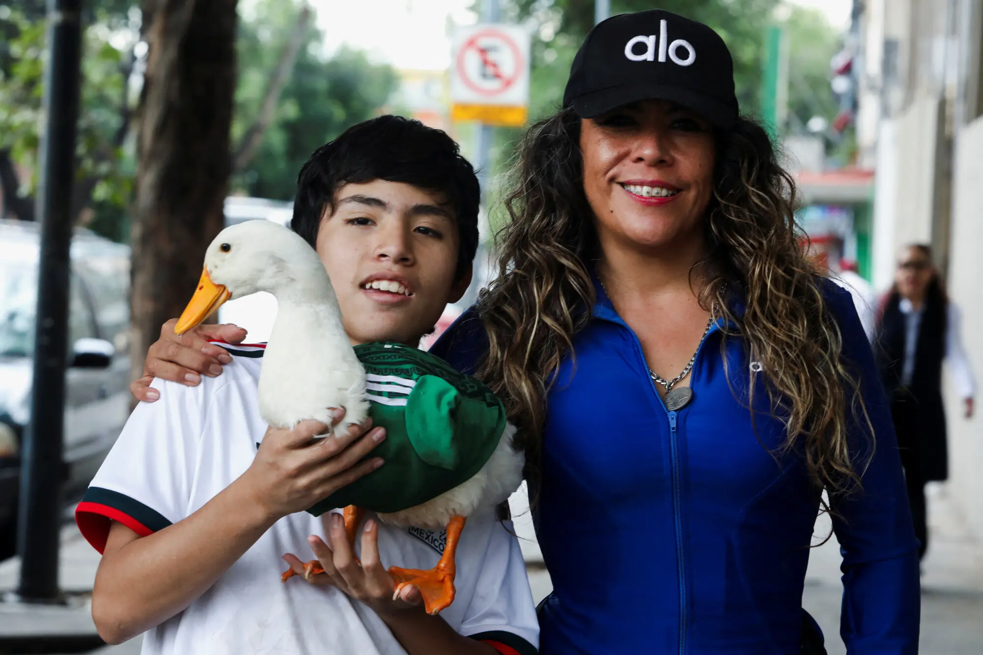 Karla Gomez, Christian and Merlin pose for a family picture. Photo: Reuters.