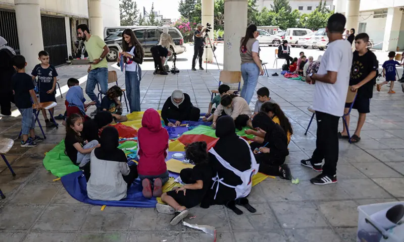 Children gather at a school-turned-shelter in Beirut.&mdash;Reuters