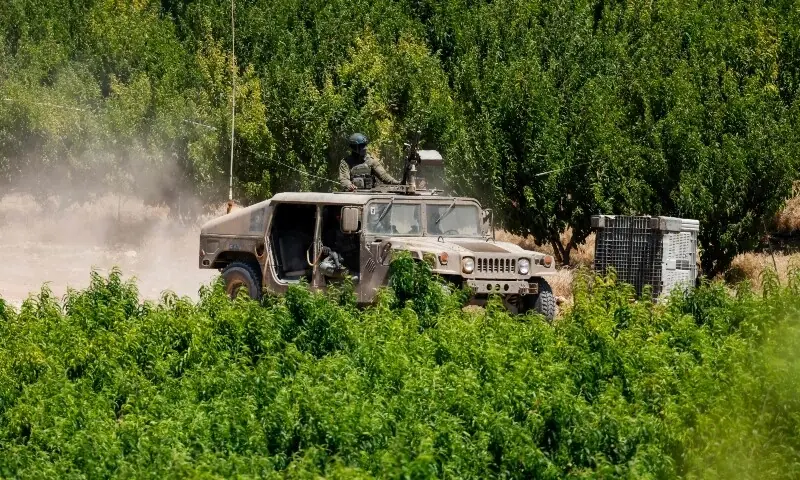 An Israeli army humvee vehicle patrols along the northern region in the Upper Galilee bordering Lebanon on June 18, 2026. &mdash;Reuters
