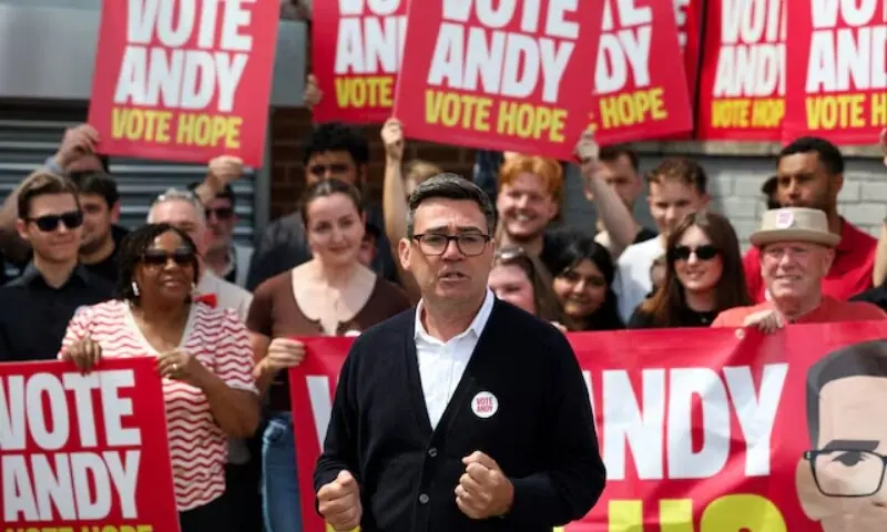Greater Manchester mayor and Labour candidate Andy Burnham meets with supporters during the Makerfield by-election, triggered by the resignation of Labour MP John Simons, in Wigan, Britain, June 18, 2026. —Reuters Greater Manchester mayor and Labour candidate Andy Burnham meets with supporters during the Makerfield by-election, triggered by the resignation of Labour MP John Simons, in Wigan, Britain, June 18, 2026. —Reuters