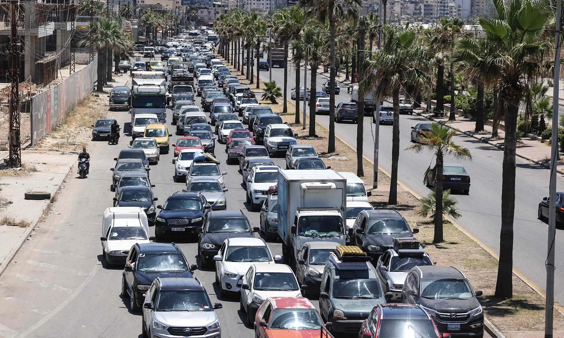 Vehicles line up in traffic at the entrance to Sidon, Lebanon on June 19, 2026, as residents flee southern villages for the capital, Beirut, following Israeli airstrikes across the country&rsquo;s south. &mdash; AFP