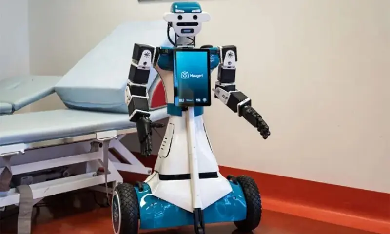 Alter-Ego, a humanoid robot, at a hospital in Milan. The hospital is training the robot to greet and interact with patients.—AFP Alter-Ego, a humanoid robot, at a hospital in Milan. The hospital is training the robot to greet and interact with patients.—AFP