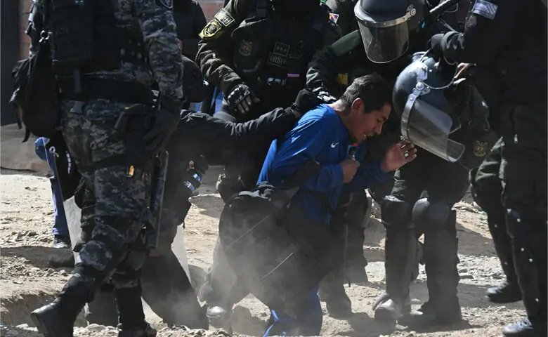 Police arrest a protester in El Alto, Bolivia.—AFP Police arrest a protester in El Alto, Bolivia.—AFP