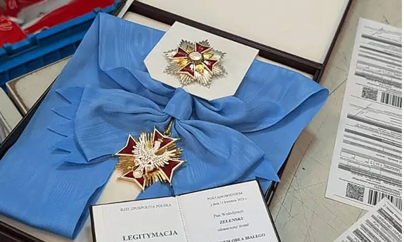 THE Order of the White Eagle, Poland’s highest state decoration, being prepared for shipment at a post office in Kyiv.—AFP THE Order of the White Eagle, Poland’s highest state decoration, being prepared for shipment at a post office in Kyiv.—AFP