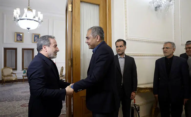 IRAN&rsquo;s Foreign Minister Abbas Araghchi greets Interior Minister Mohsin Naqvi in Tehran.&mdash;AFP