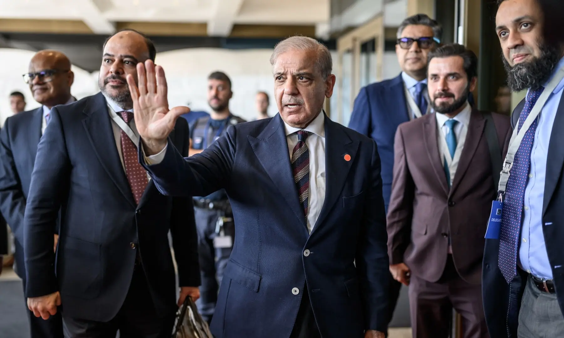 Prime Minister Shehbaz Sharif gestures upon his arrival at the Burgenstock luxury hotel complex overlooking Lake Lucerne, Switzerland, on June 21. &mdash; AFP