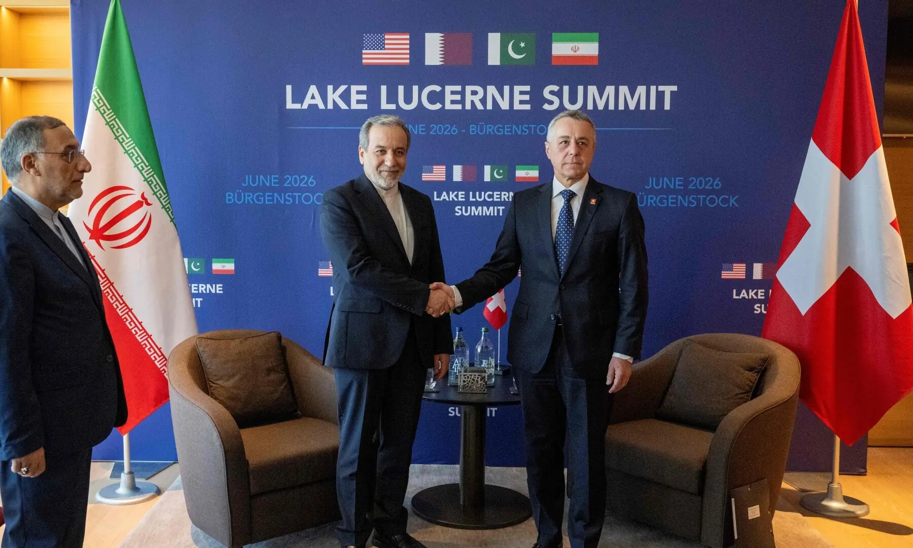 Iran’s Minister of Foreign Affairs Seyyed Abbas Araghchi (L) and Swiss Federal Council, Ignazio Cassis shake hands as they take part in bilateral discussions at the Burgenstock resort in Obbuergen, near Lucerne on June 21. — AFP