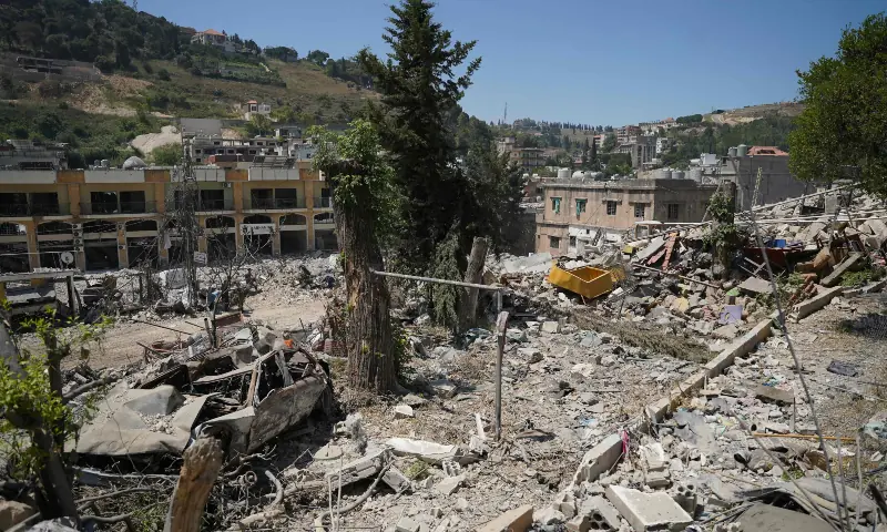 A destroyed vehicle sits amongst the rubble of the main market place destroyed by the Israeli military in the southern city of Nabatieh on June 21, 2026. &mdash; AFP