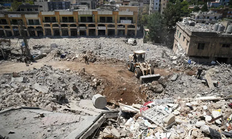 A bulldozer removes the rubble from the main market place destroyed by the Israeli military in the southern city of Nabatieh on June 21, 2026. &mdash; AFP