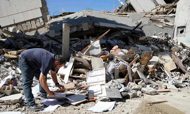 A LEBANESE man inspects the damage at the site of Lebanon’s central bank building, which was targeted in an Israeli strike on Nabatieh.—AFP A LEBANESE man inspects the damage at the site of Lebanon’s central bank building, which was targeted in an Israeli strike on Nabatieh.—AFP