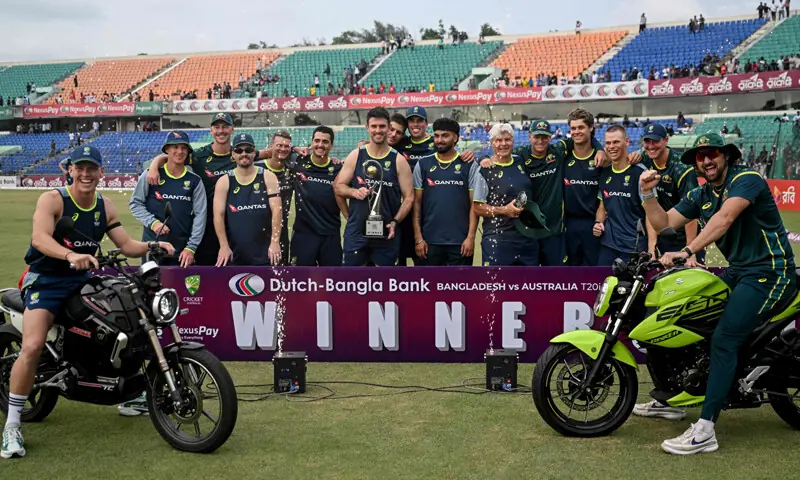 AUSTRALIAN captain Mitchell Marsh (C) holds the T20 series trophy alongside team-mates after defeating Bangladesh in the third match at the Bir Sreshtho Flight Lieutenant Matiur Rahman Stadium on Sunday.—AFP AUSTRALIAN captain Mitchell Marsh (C) holds the T20 series trophy alongside team-mates after defeating Bangladesh in the third match at the Bir Sreshtho Flight Lieutenant Matiur Rahman Stadium on Sunday.—AFP