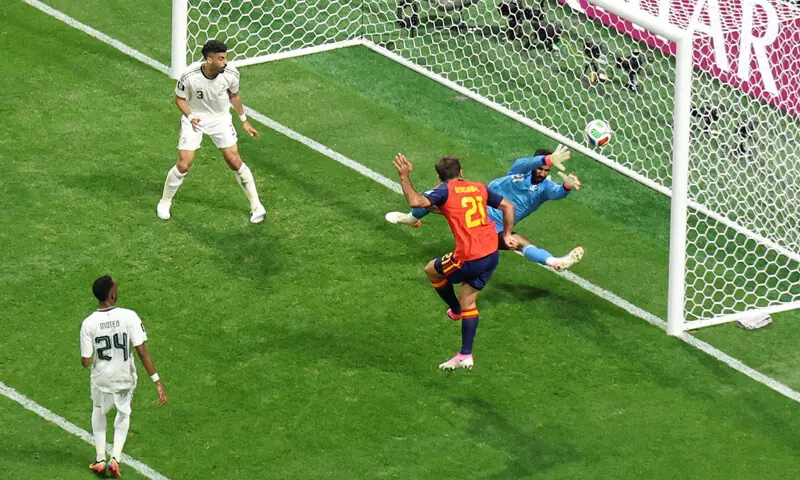 SPAIN’S Mikel Oyarzabal scores past Saudi Arabia goalkeeper Mohammed El-Owais during their Group ‘H’ match at the Atlanta Stadium.—Reuters SPAIN’S Mikel Oyarzabal scores past Saudi Arabia goalkeeper Mohammed El-Owais during their Group ‘H’ match at the Atlanta Stadium.—Reuters