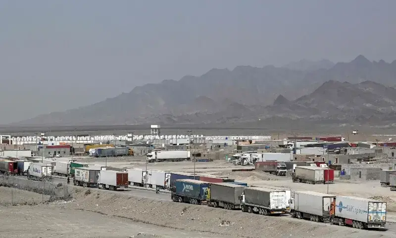 Cargo trucks wait to enter the Pakistan-Iran border crossing at Taftan, Balochistan province on March 2, 2026 amid US-Israel strikes on Iran. &mdash;AFP/File
